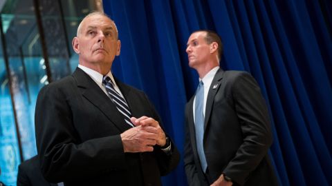 White House Chief of Staff Gen. John Kelly, left, looks on as President Donald Trump speaks following a meeting on infrastructure at Trump Tower on Tuesday in New York. Trump fielded questions from reporters about his comments on the events in Charlottesville, Virginia, and white supremacists.