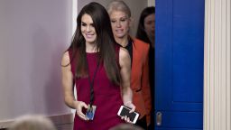 Hope Hicks, White House director of strategic communications, center, and Kellyanne Conway, senior advisor to U.S. President Donald Trump, arrive before a press briefing by White House Press Secretary Sean Spicer, not pictured, at the White House in Washington, D.C., U.S., on Monday, Jan. 23, 2017. With the stroke of a pen, Trump today abruptly ended the decades-old U.S. tilt toward free trade by signing an executive order to withdraw from an Asia-Pacific accord that had been promoted by companies including Nike Inc. and Wal-Mart Stores Inc. as well as family farmers and ranchers. 