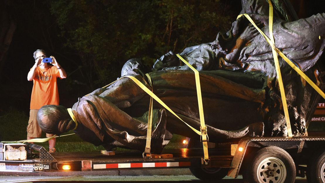 A monument dedicated to Maryland's Confederate women gets taken down early Wednesday. 