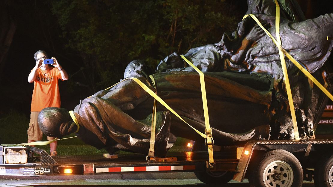 A monument dedicated to Maryland's Confederate women gets taken down early Wednesday.