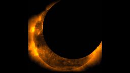 Spectacular images from the Hinode spacecraft show the solar eclipse, which darkened the sky in parts of the Western United States and Southeast Asia yesterday, May 20, 2012. This image shows the maximum eclipse.