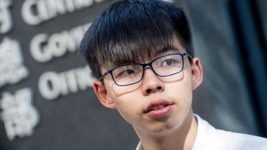 Student protest leader Joshua Wong speaks to the media about his recent arrest and detention ahead of the visit by China's President Xi Jinping, outside Civic Square at the Central Government Offices in Hong Kong on June 30, 2017.
Wong was amongst 26 activists arrested the past few days who were released from police custody in the early hours of June 30 after threatening to go to the High Court to petition against their ongoing incarceration. Xi arrived in Hong Kong on June 29 for a three-day visit to mark the 20th anniversary of the territory's handover from British to Chinese rule. / AFP PHOTO / Jayne Russell        (Photo credit should read JAYNE RUSSELL/AFP/Getty Images)