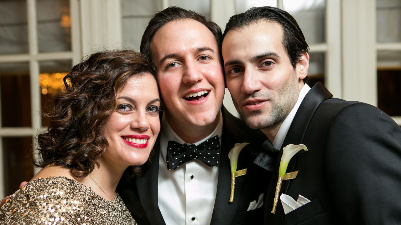 Victoria, Rami and Khalid Jabara celebrate at Rami's wedding.