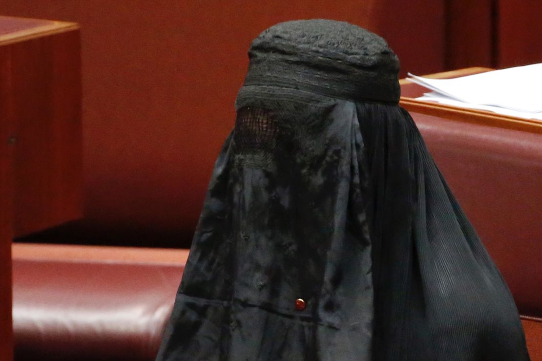 Senator Pauline Hanson wears a burqa in the Senate chamber at Parliament House in Canberra, Australia, Thursday, Aug. 17.