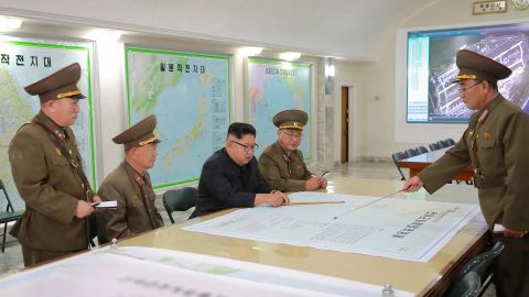 A picture released by KCNA on August 15, 2017, shows Kim Jong Un inspecting the Command of the Strategic Force of the Korean People's Army at an undisclosed location. 