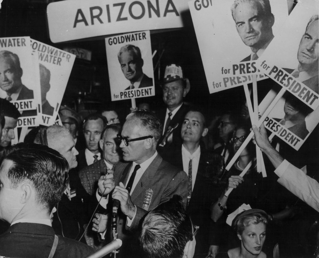 Sen. Barry Goldwater, surrounded by his supporters as he campaigns for president in 1964.