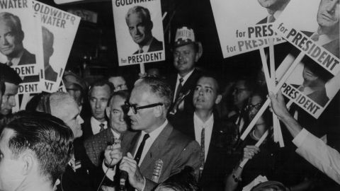 Sen. Barry Goldwater, surrounded by his supporters as he campaigns for president in 1964.
