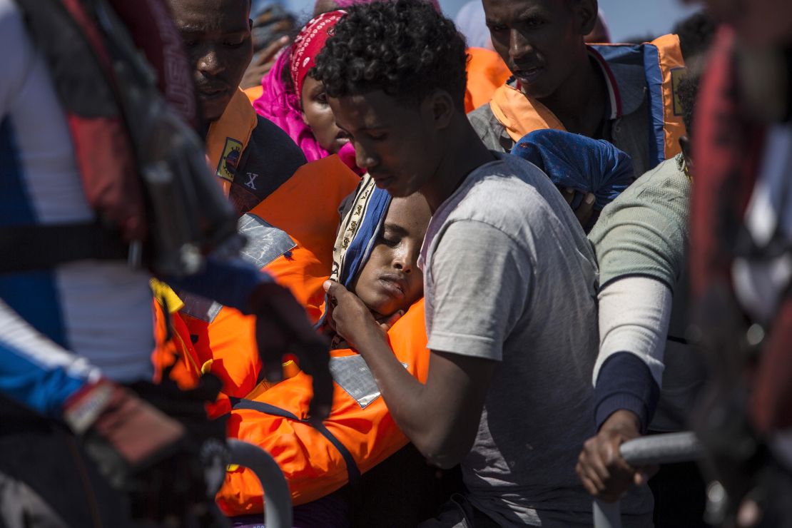 Members of the Aquarius crew attend to migrants rescued off the Libyan coast in August 2017. 