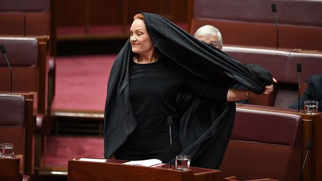 Australian Senator Pauline Hanson wears a burqa in Parliament as she calls for a burqa ban.