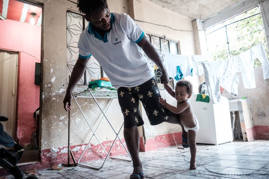 Misenga now has a new family in Rio, living in one of the city's many favelas with his Brazilian partner and their children.
