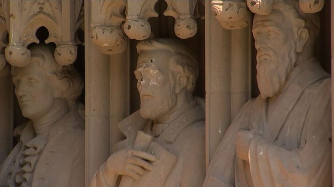 Statue of General Robert E. Lee (center) on the portal of Duke University's chapel was defaced.