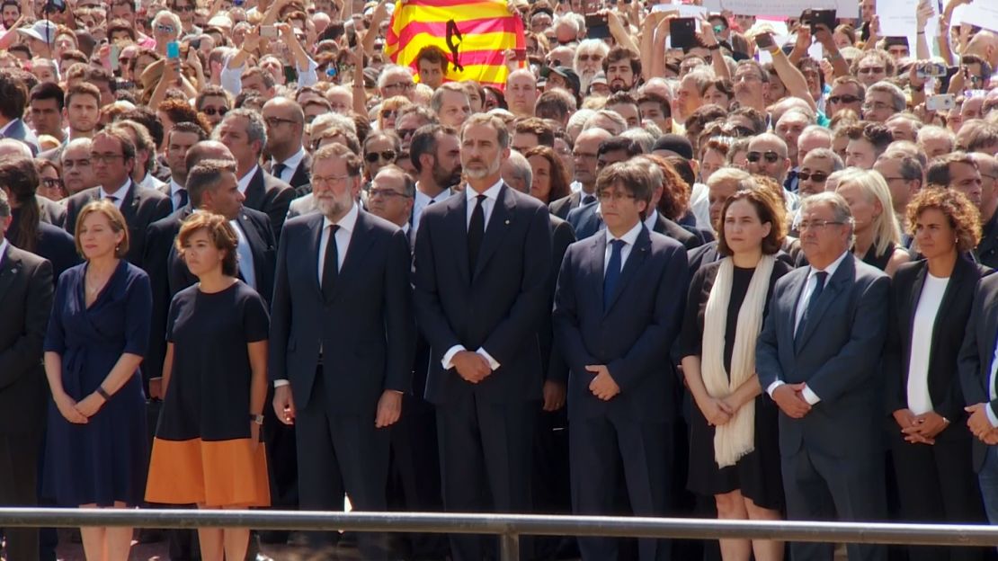 King Felipe VI of Spain leads a moment of silence  in Plaça de Catalunya on Friday.