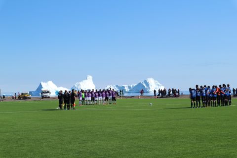 Icebergs float just off shore and calve often creating mini tsunamis that crash onto the beach a few meters from the pitch. 