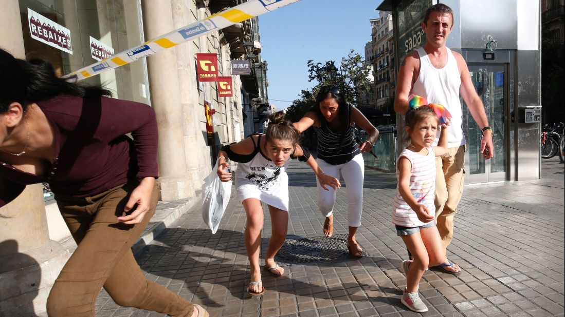 People evacuate an area of Barcelona on August 17.