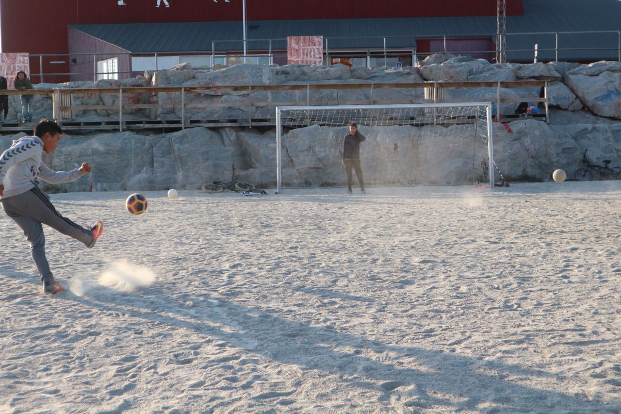 Before the artificial turfs were built two years ago, Greenlandic football was played on pitches of sand and rock. 