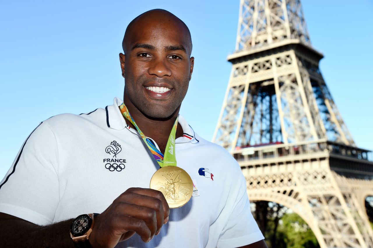 Teddy Riner poses with his gold medal from Rio 2016 in front of the Eiffel Tower. The Frenchman successfully defended his 100+kg title from London 2012, beating Japan's Hisayoshi Harasawa in the final.