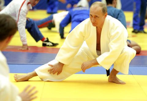 Russian President Vladimir Putin is a judo master, denoted by wearing a black belt. 