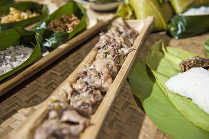 <strong>Manok Pansoh</strong><strong>:</strong> Manok Pansoh is a traditional dish of the Iban and Bidayuh people of Sarawak. The chicken is first marinated with herbs and spices before being slow-cooked inside a long piece of bamboo over hot coals or wood fire.