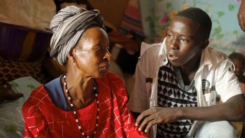 Hawa Marah and her grandson. She lost three of her five children, and her home in the disaster and doesn't know where she and her family will live going forward.