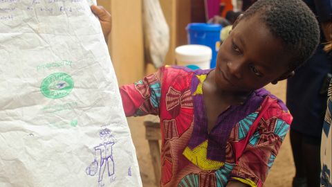 Children at a shelter for people made homeless by the Freetown mudslides. Aid groups are trying to ensure they are fed and helped.