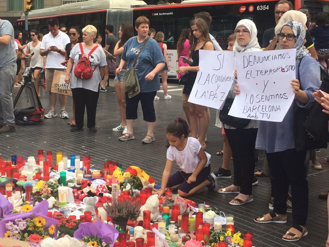 Muslim women denounce terrorism at a memorial Saturday on Las Ramblas in Barcelona.
