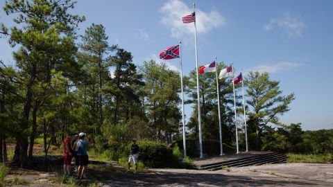 This plaza features the US flag, a Confederate battle flag and other Confederate banners.