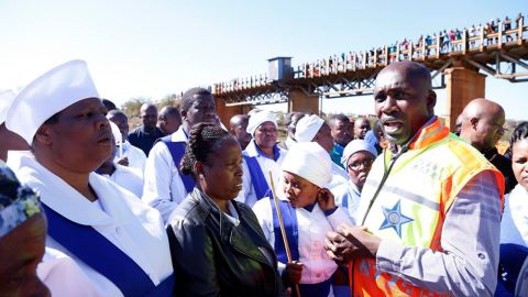 Local officials address community members after deadly minibus crash near Pietermaritzburg, South Africa.