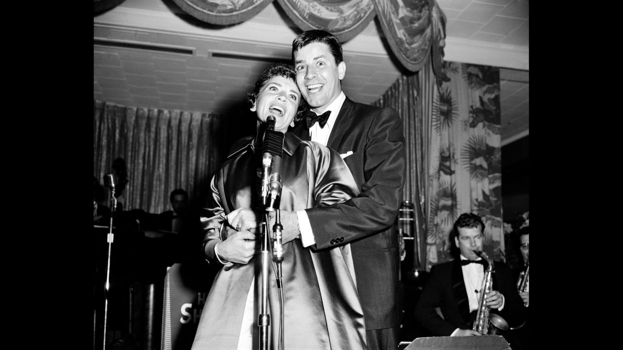 Lewis and his wife, Patti, sing in an impromptu New York performance in 1955. They divorced in 1982.