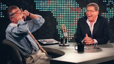 Lewis brings former CNN host Larry King to tears with a joke in 1999.