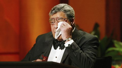 Lewis wipes away tears at the 39th Annual Jerry Lewis MDA Labor Day Telethon in 2004. In 2011, Lewis and the Muscular Dystrophy Association announced they were parting ways.