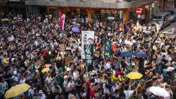 HONG KONG, HONG KONG - AUGUST 20: Protesters attend a rally to support young activists Joshua Wong, Nathan Law and Alex Chow in Wanchai on August 20, 2017 in Hong Kong, Hong Kong. Pro-democracy activists Joshua Wong, Nathan Law and Alex Chow were jailed last week after being convicted of unlawful assembly. (Photo by Billy H.C. Kwok/Getty Images)