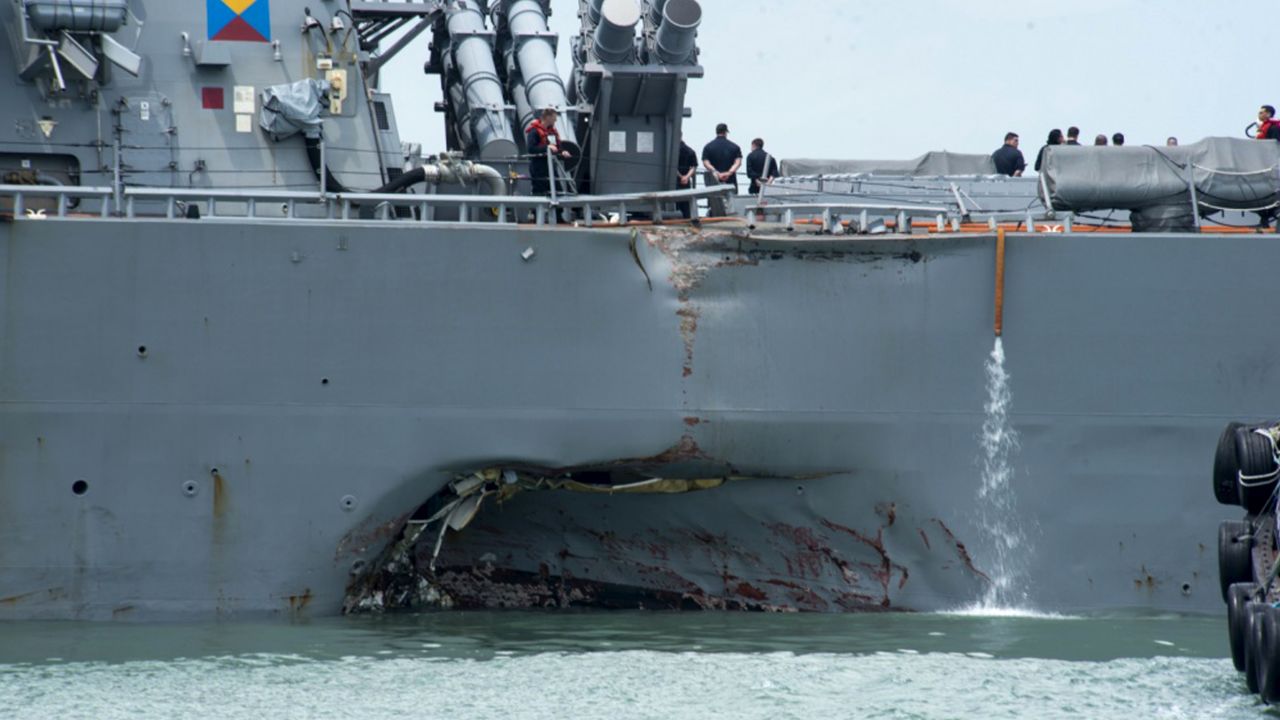 The collision left major damage to the port side of the USS John S. McCain, seen here in Singapore.