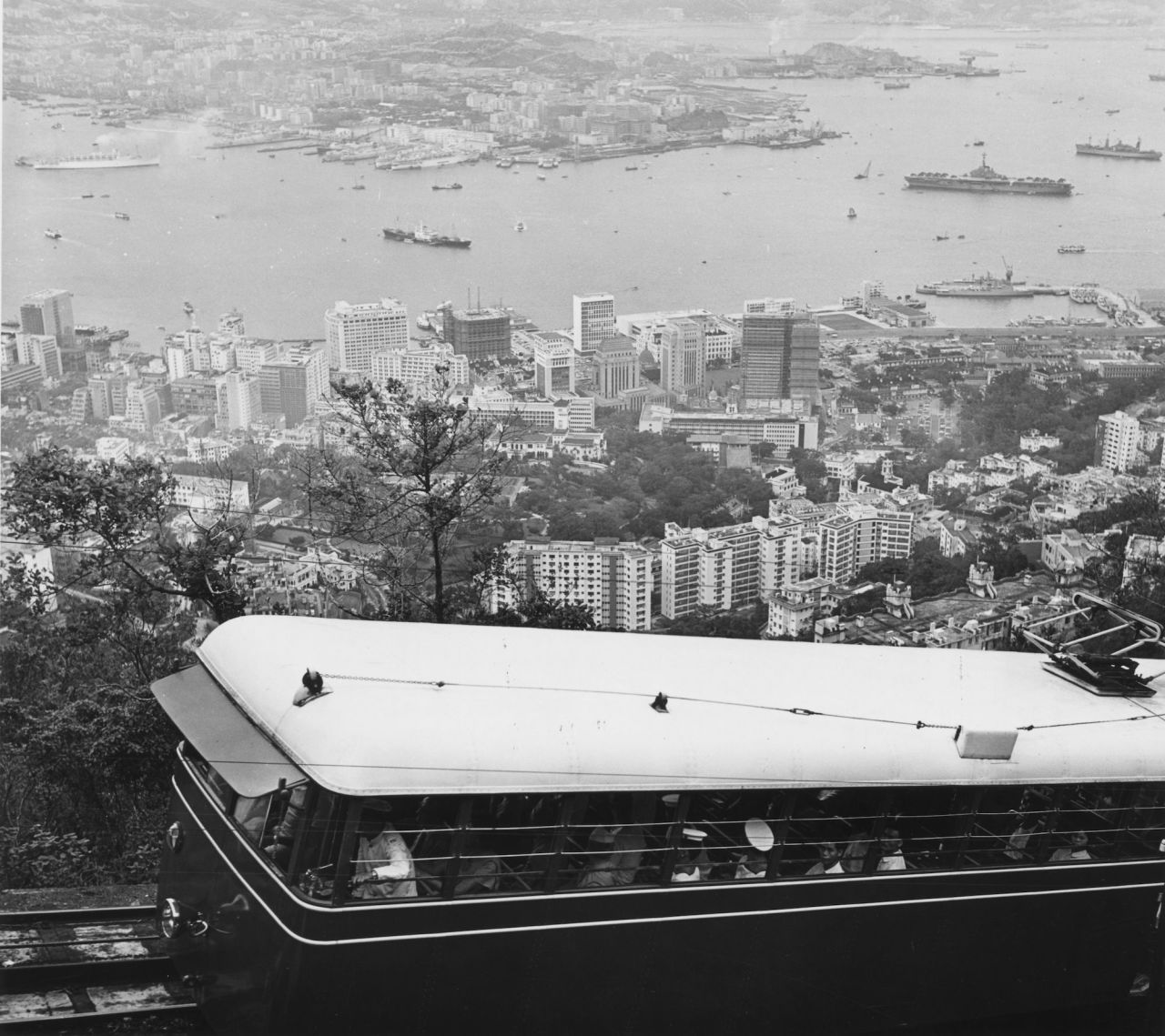 <strong>Circa 1960: </strong> A tram on its way to Victoria Peak, Hong Kong, with the city of Victoria below and Kowloon across the water.  During Hong Kong's stint as a British colony, from 1841 to 1997, The Peak was the city's most exclusive neighborhood.