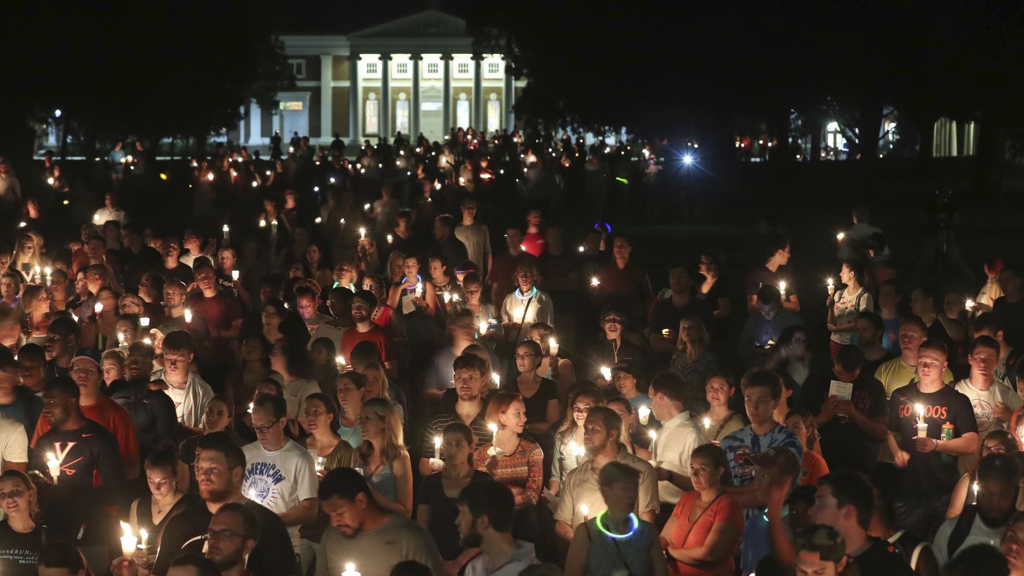 University of Virginia students, faculty and residents attend a candlelight march on campus on Wednesday, August 16 -- four days after Charlottesville erupted in chaos during a white nationalist rally.