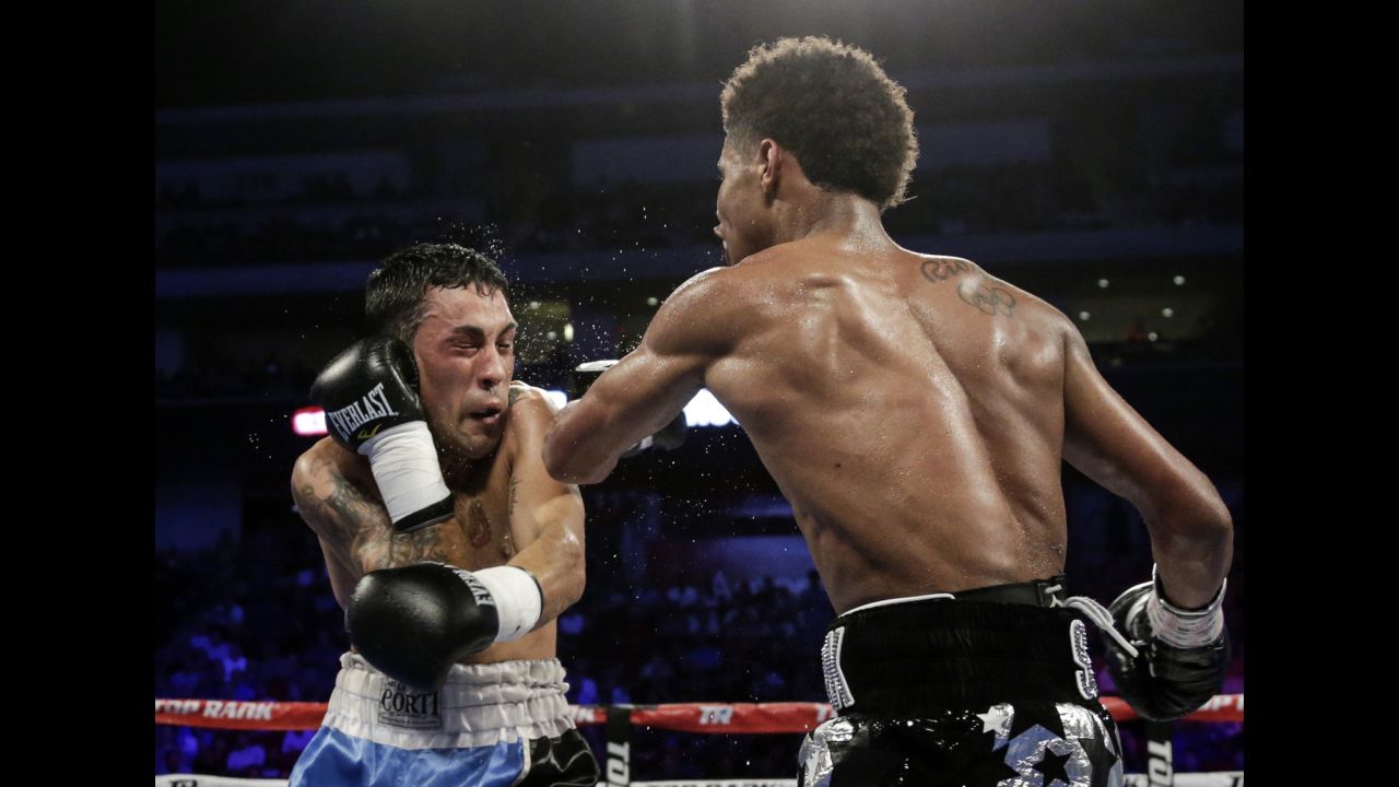Shakur Stevenson, right, punches David Paz during their super-featherweight bout in Lincoln, Nebraska, on Saturday, August 19. Stevenson won by unanimous decision.