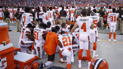  A group of Cleveland Browns players kneel in a circle in protest during the national anthem prior to a preseason game against the New York Giants at FirstEnergy Stadium on August 21, 2017 in Cleveland, Ohio.