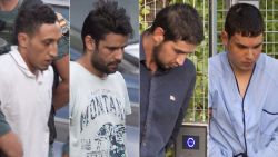 Left to right: Driss Oukabir, Mohamed Aallaa, Salah El Karib, Mohamed Houli Chemlal, suspected of involvement in the terror cell that carried out twin attacks in Spain, is escorded by Spanish Civil Guards from a detention center in Tres Cantos, near Madrid, on August 22, 2017 before being tranferred to the National Court. Under heavy security, police vans entered the National Court, which deals with terrorism cases, where a judge will question them and decide what -- if any -- charges to press against them over the vehicle attacks that left 15 dead and 120 injured.