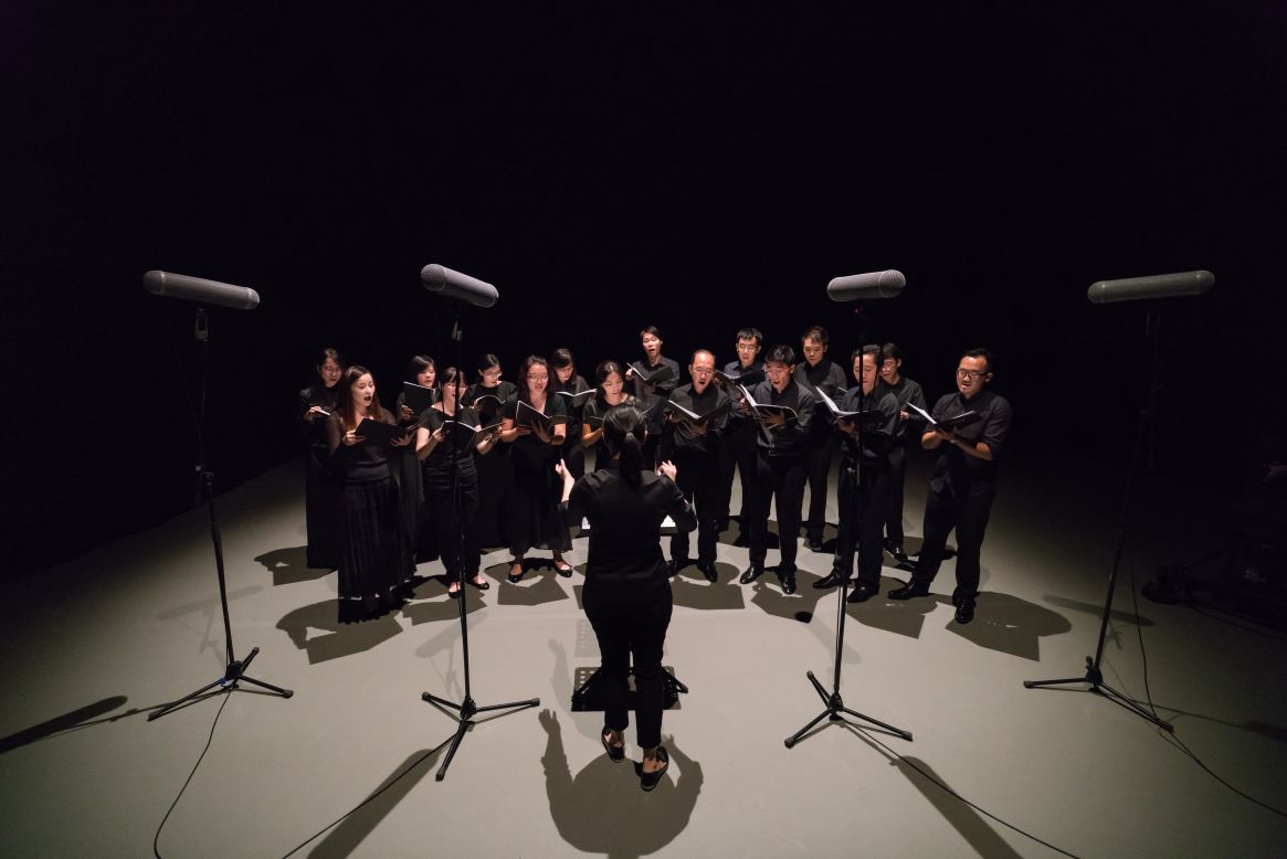 Hong Kong artist Samson Young's video piece strips away the music of a choral performance, leaving behind only the background sounds. 