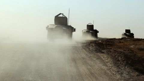 Iraqi forces, backed by Shiite fighters from the Popular Mobilization Forces, advance towards the Iraqi city of Tal Afar 
