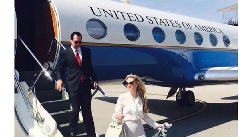 Treasury Secretary Steven Mnuchin's wife Louise Linton had an exchange with an Instagram user on Monday night after the user criticized for tagging several designer brands in an image of the couple de-boarding a government plane.