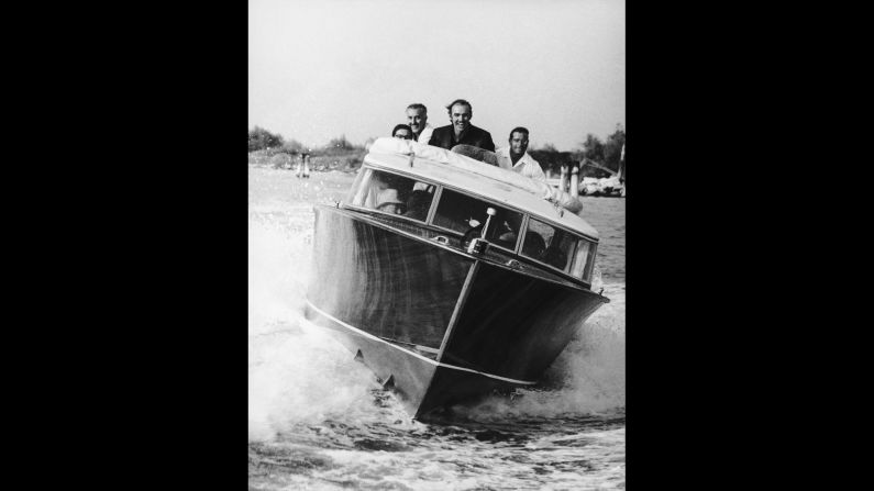 Sean Connery at the helm of a motorboat during the 28th Film Festival in 1967.