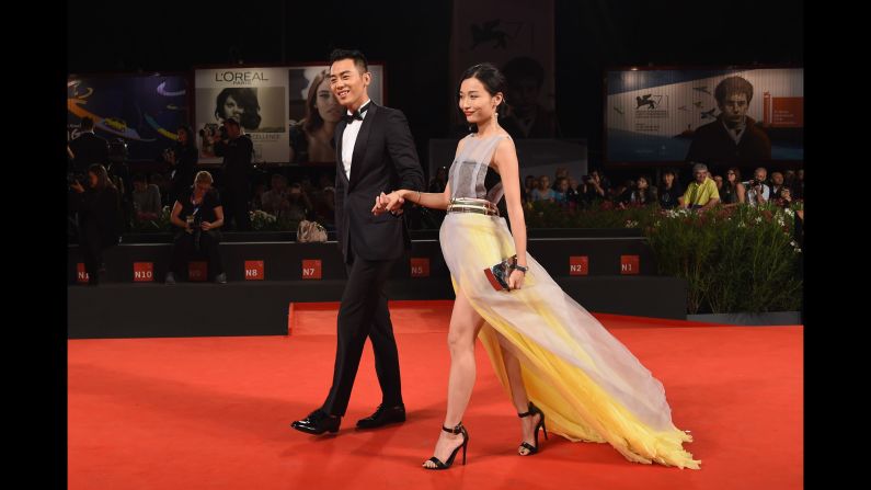 Chinese stars Zhu Yawen and Tuan Yuan attend the Premiere of "The Golden Era" during 71st Venice Film Festival.