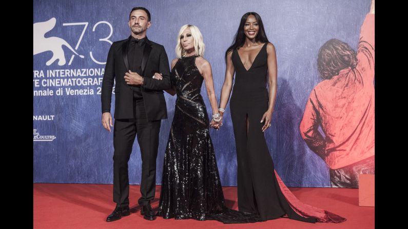 When fashion meets film. Givenchy's former head designer Riccardo Tisci poses with Donatella Versace and Naomi Campbell at the premiere of "Franca: Chaos and Creation," a documentary film about Italian Vogue editor Franca Sozzani.