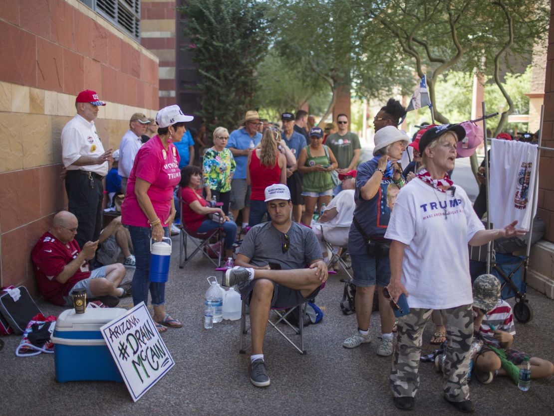 Pro-Trump demonstrators gather before the rally. 