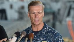 Vice Adm. Joseph Aucoin, Commander of the US 7th Fleet, delivers a speech during a press conference in front of the guided missile destroyer USS Fitzgerald at US Navy Yokosuka Base, southwest of Tokyo on June 18, 2017.
A number of missing American sailors have been found dead in flooded areas of a destroyer that collided with a container ship off Japan's coast, the US Navy said on June 18, 2017. / AFP PHOTO / Kazuhiro NOGI        (Photo credit should read KAZUHIRO NOGI/AFP/Getty Images)