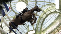 Australian Edwina Alexander, riding Cevo Itot Du Chateau, competes during the International Jumping Competition on April 4, 2010, at The Grand Palais in Paris. Edwina Alexander finished 6th and German Marcus Ehning won the event.  AFP PHOTO / FRANCK FIFE (Photo credit should read FRANCK FIFE/AFP/Getty Images)
