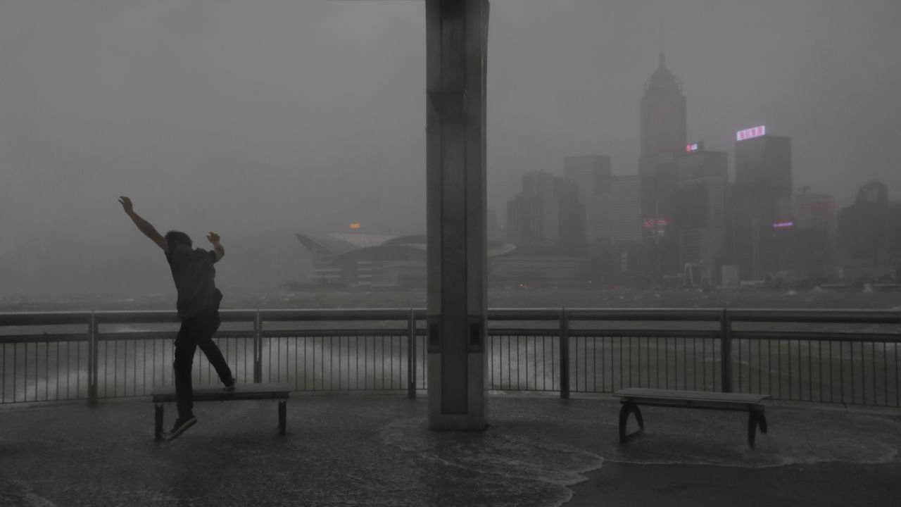 Strong winds hit the waterfront of Victoria Harbor on Wednesday in Hong Kong as Hato approaches.