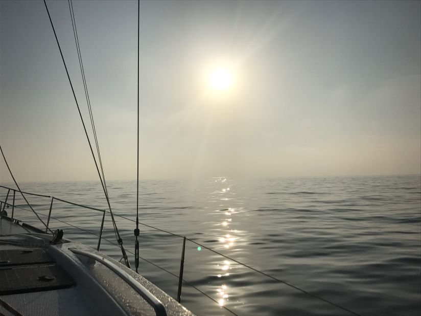 Sunrise is one of the couple's favorite times of day, captured here on a bumpy crossing between Mallorca and Sardinia.