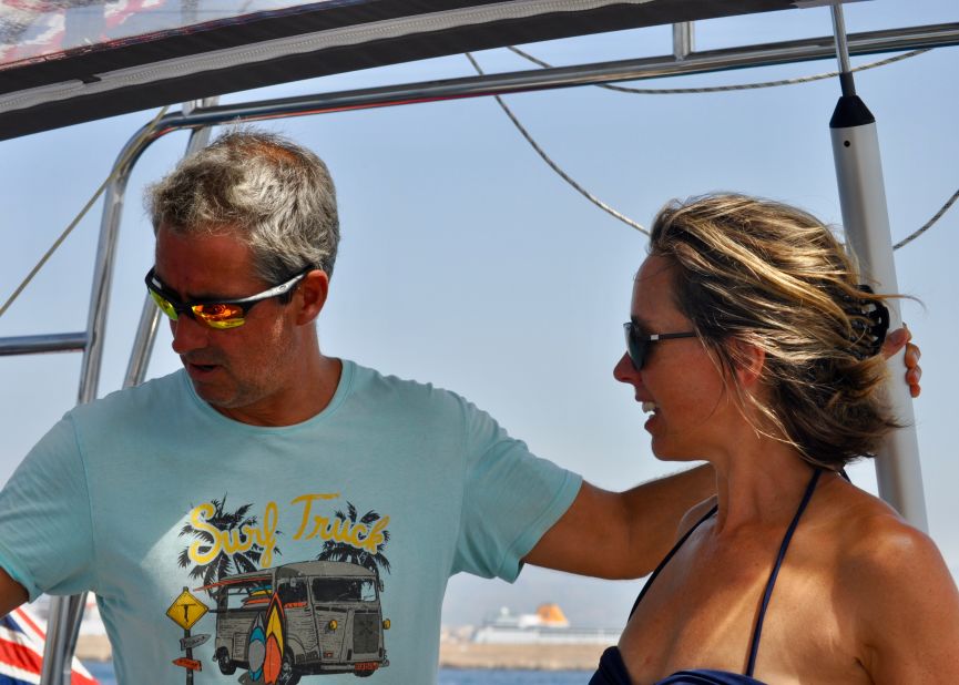 Jonathan hands over the helm to Kellie off the coast of Mallorca.