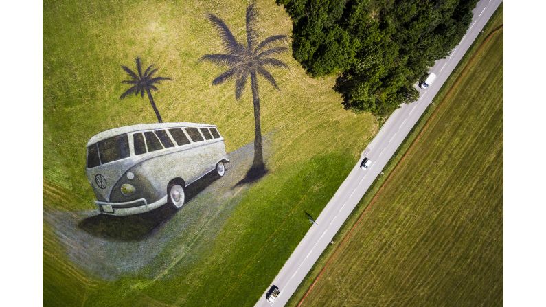 <strong>Chateau d'Oex, Switzerland:</strong> A land art painting on a hill by French artist portrays a classic Volkswagen camper van. The artwork covers 4,200 square meters and was produced with over 400 liters of biodegradable paint to celebrate an international VW festival.